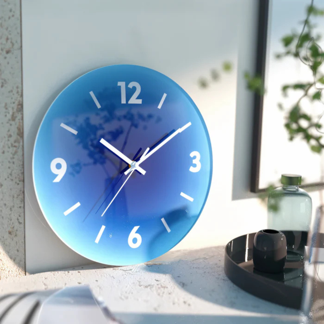 Élégant coucher de soleil - Horloge murale en verre pour une atmosphère chaleureuse