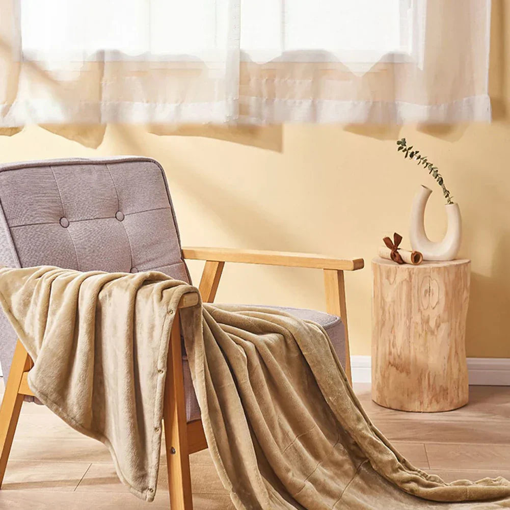Chaleur douce avec la couverture électrique CozyHeat - Douce, portable et réglable pour un confort ultime avec connexion USB