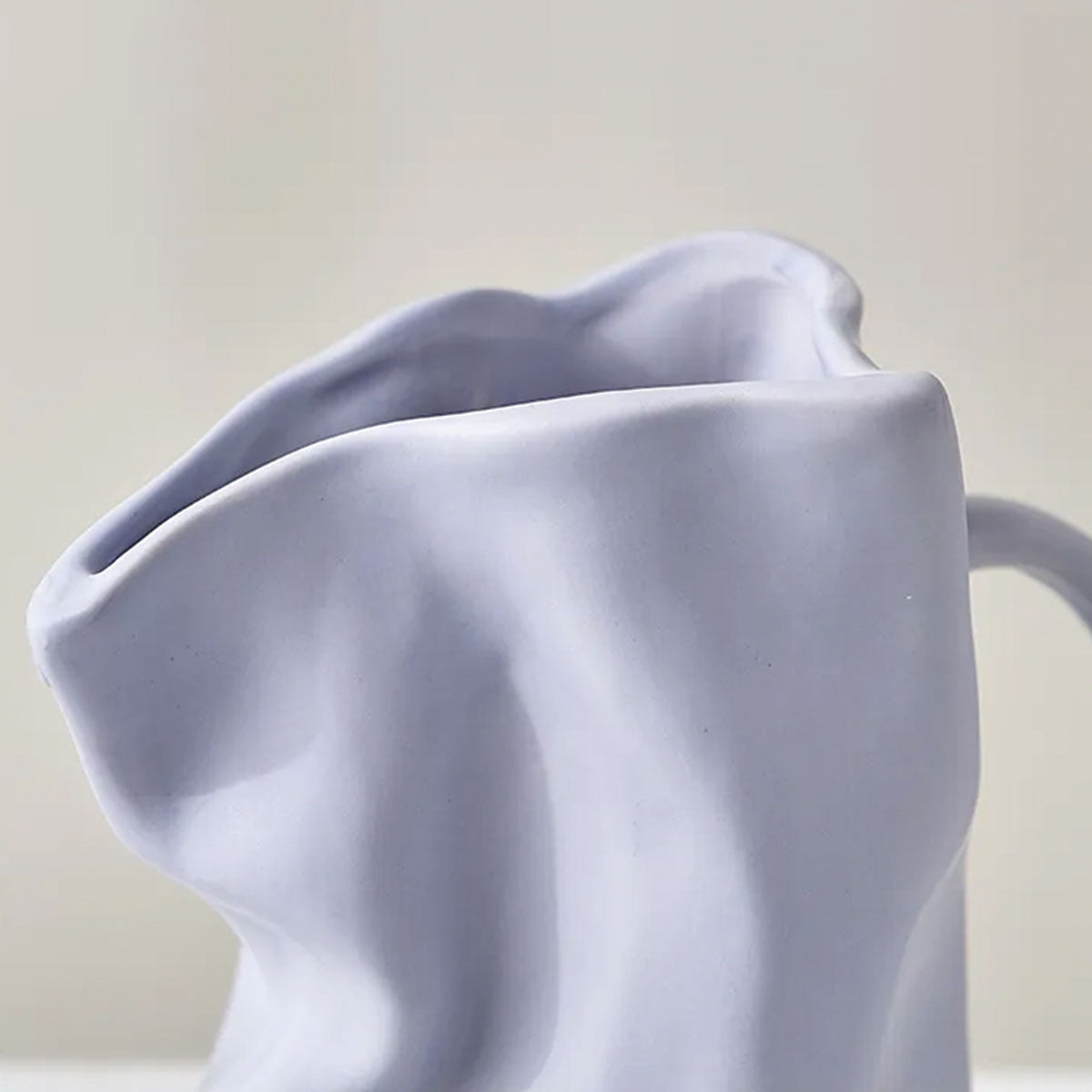 Vase plié en forme de tasse à café