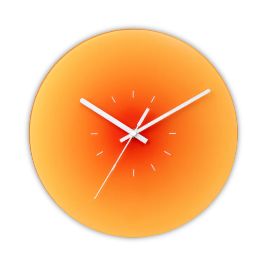 Élégant coucher de soleil - Horloge murale en verre pour une atmosphère chaleureuse
