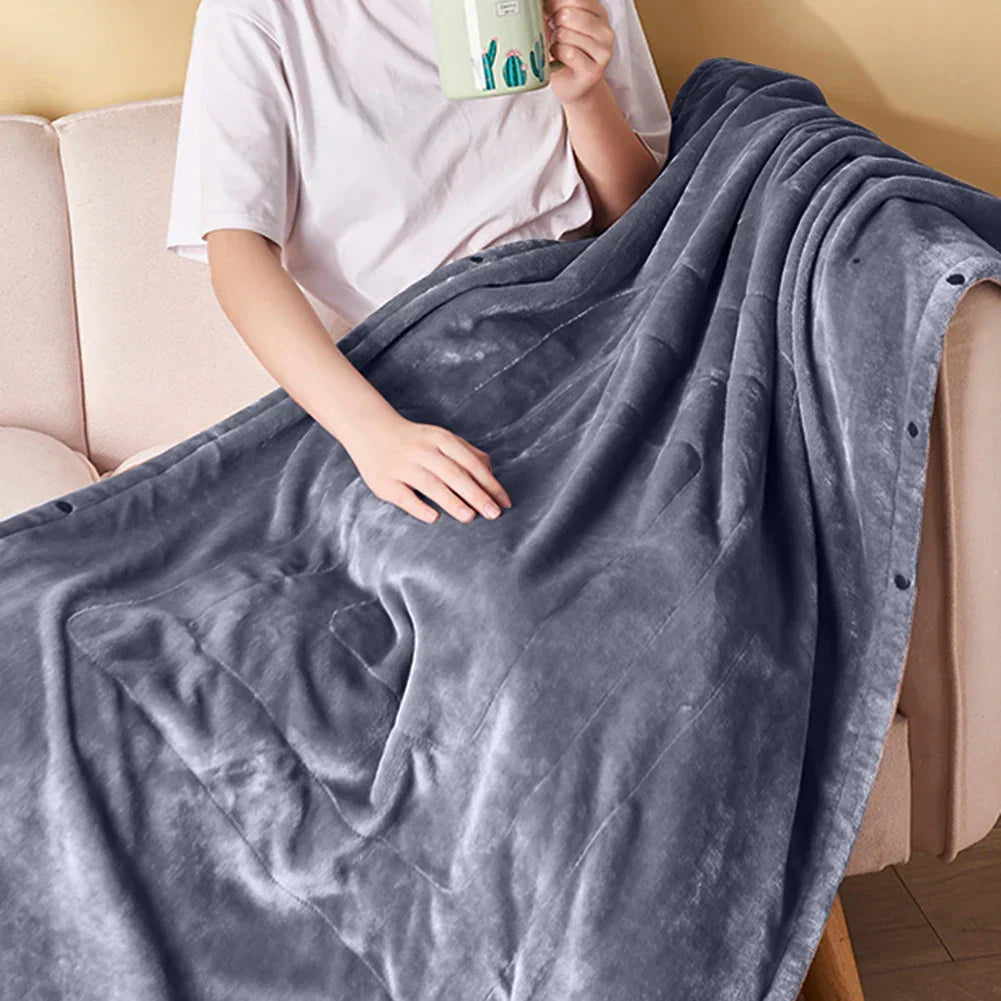 Chaleur douce avec la couverture électrique CozyHeat - Douce, portable et réglable pour un confort ultime avec connexion USB