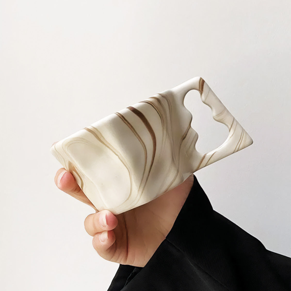 Tasse en forme ovale