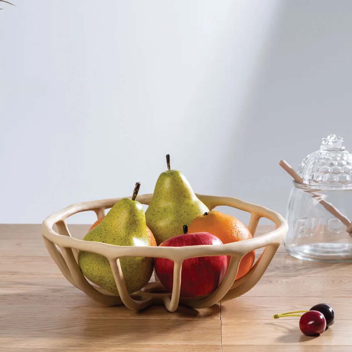 Bol à fruits en résine élégant et sculpté pour une présentation raffinée